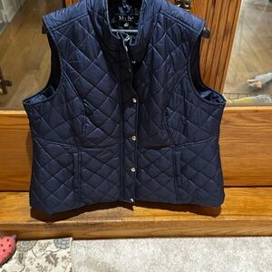 Blue vest with zipper and snaps
